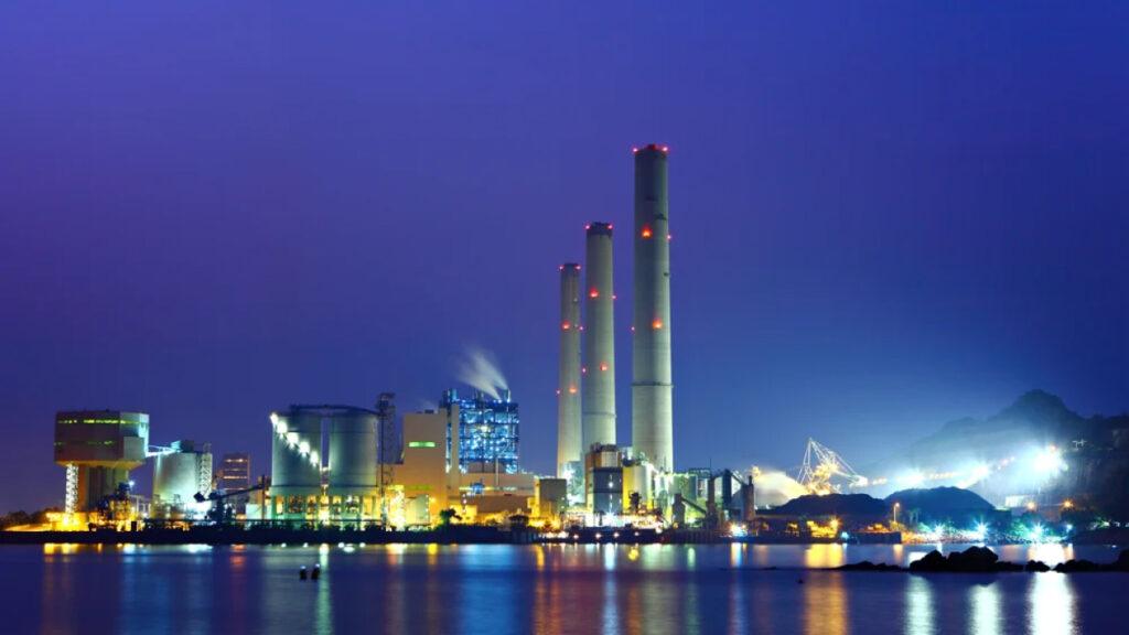 Everything you need to know about saving energy. Power station at night.