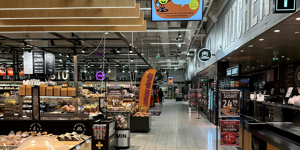 K-Citymarket Pori Puuvilla store interior with modern refrigeration systems on display.